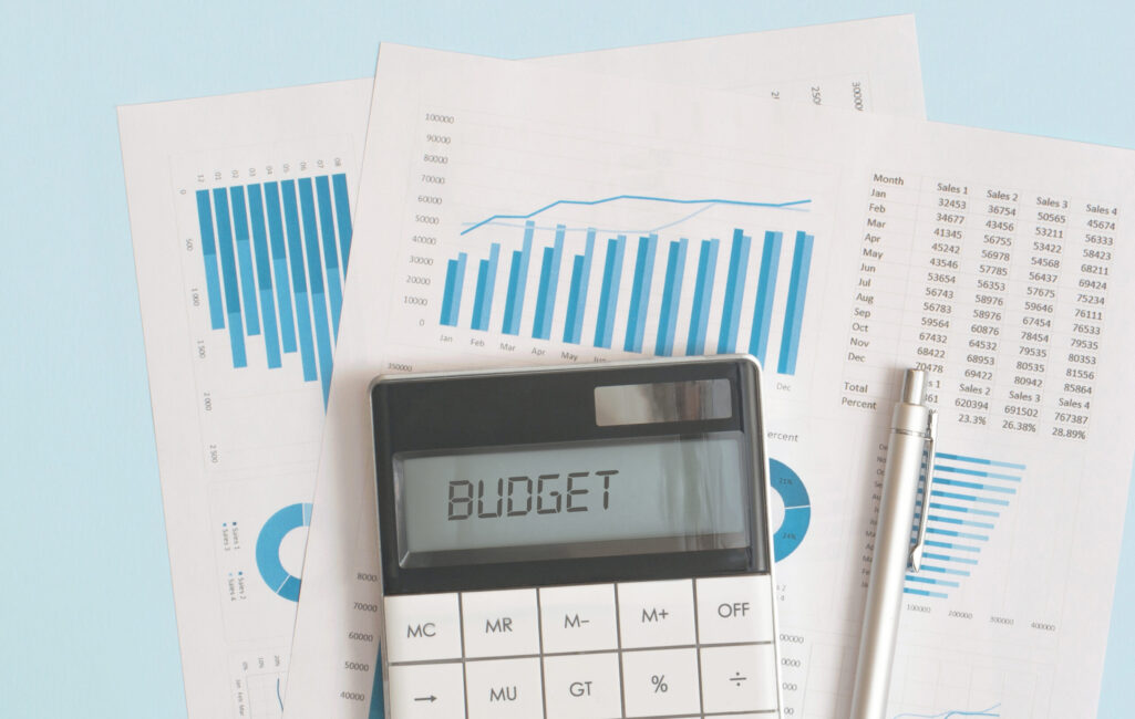 Business graphs, charts and calculator on table. Financial development, Banking Account, Statistics